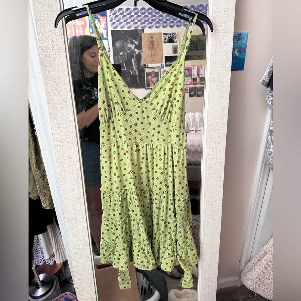 brown and green flower dress